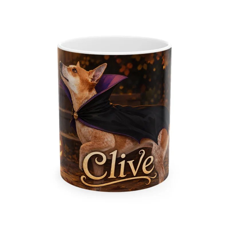 A pet's photo with the dog dressed in a black vampire cape with a purple lining, on a fall porch beside a glowing jack-o-lantern, on a personalized ceramic mug, with the pet's name Clive